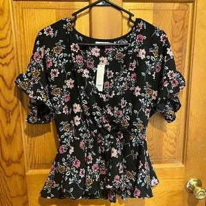 Floral blouse with tags still on. Size small